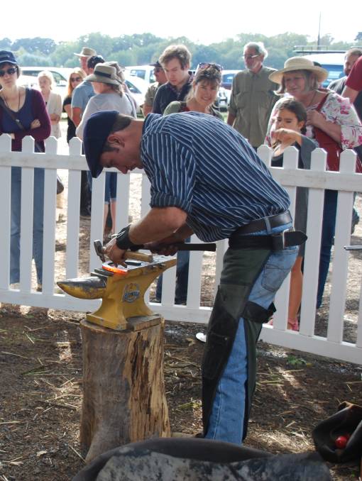 Master farrier, Liam Sing, captivates the crowds with his skills at the Lost Trades Fair in Kyneton last weekend. Master farrier, Liam Sing, captivates the crowds with his skills at the Lost Trades Fair in Kyneton last weekend.